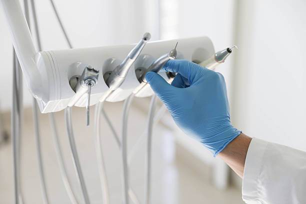 Professional Tooth Extraction technician working in Graham County County, NC